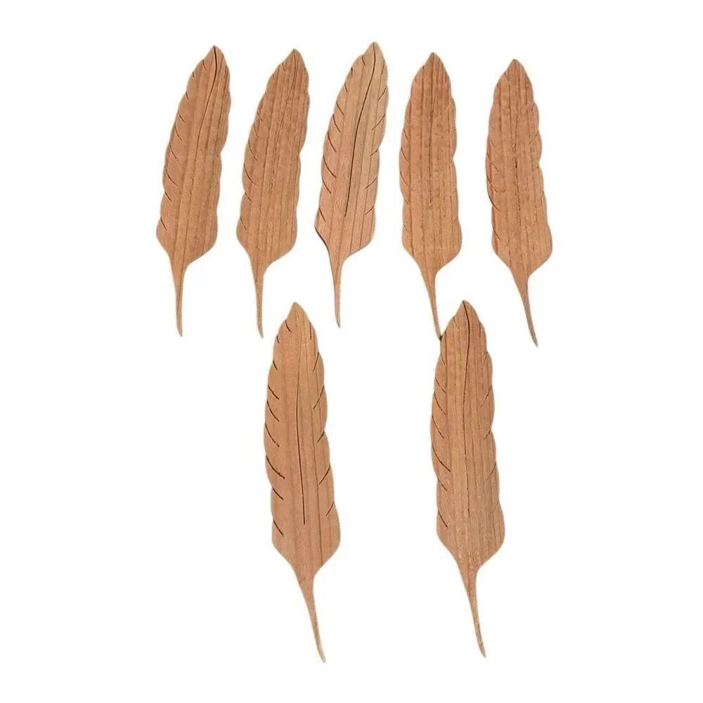 7 Hand Carved 5 1/4” Wooden Feathers